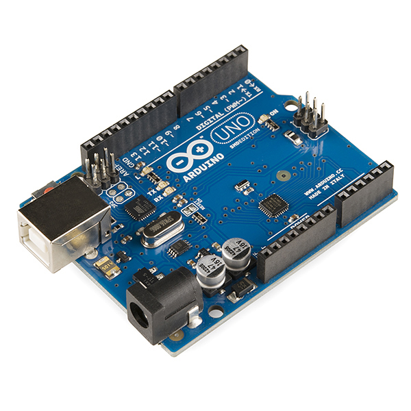 Picture of an Arduino Uno board, showing power and USB ports, exposed circuitry, and pins.